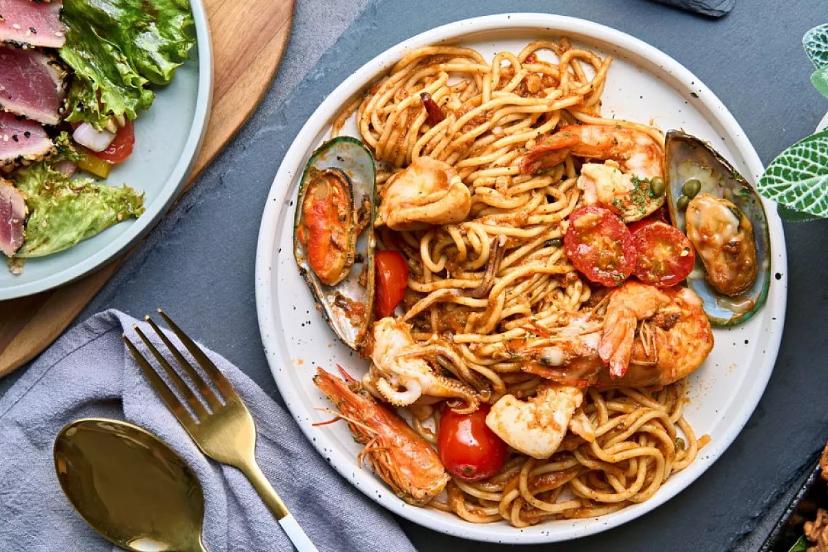 Spaghetti al sugo di pesce