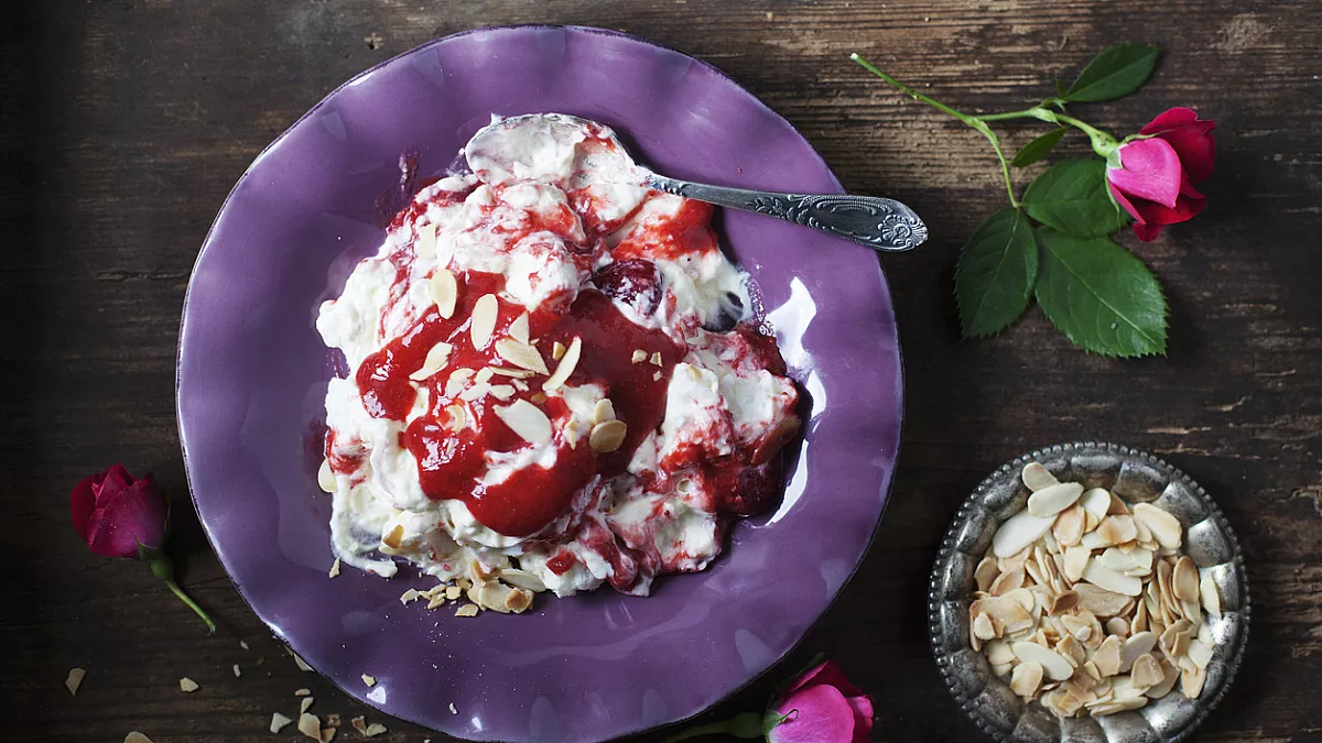 Eton Mess with strawberries and rose oil.