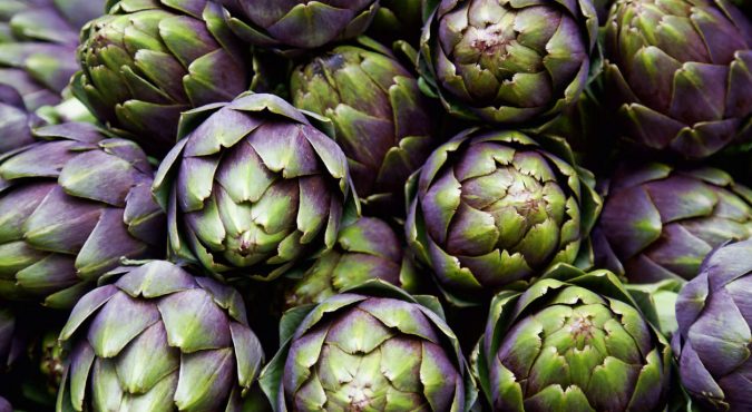 full frame of purple italian artichokes
