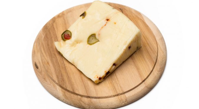 Canestrato cheese with olives and pepper, Italian Food