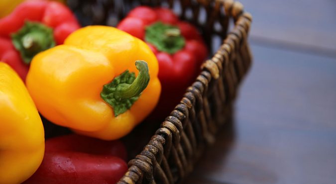 Fresh bell peppers in a basket