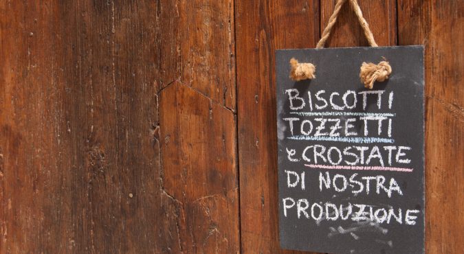 Italian and local desserts menu on the blackboard