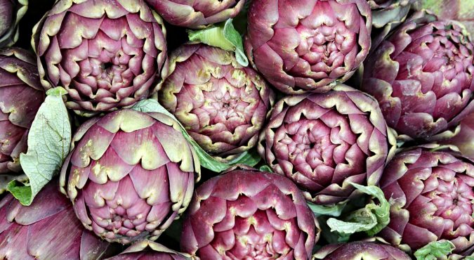 ripe artichokes for sale in the fruit and vegetable market