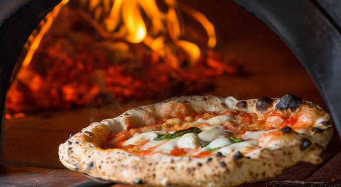 baked tasty margerita pizza near oven